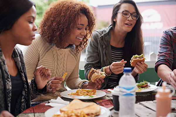 Au pairs sharing meals together at the hotel